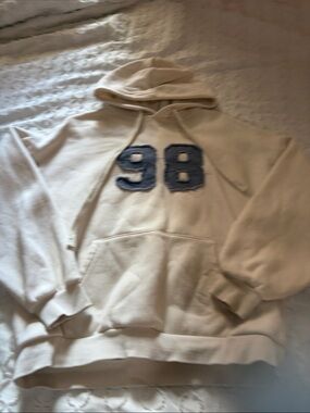 Woman's Cream Hooded Sweatshirt with Blue '98' Appliqué